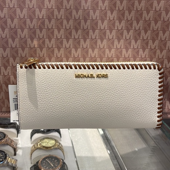 Michael Kors Jet Set Travel Large Pebble Leather Quarter-Zip Wallet
NWT - Picture 4 of 16